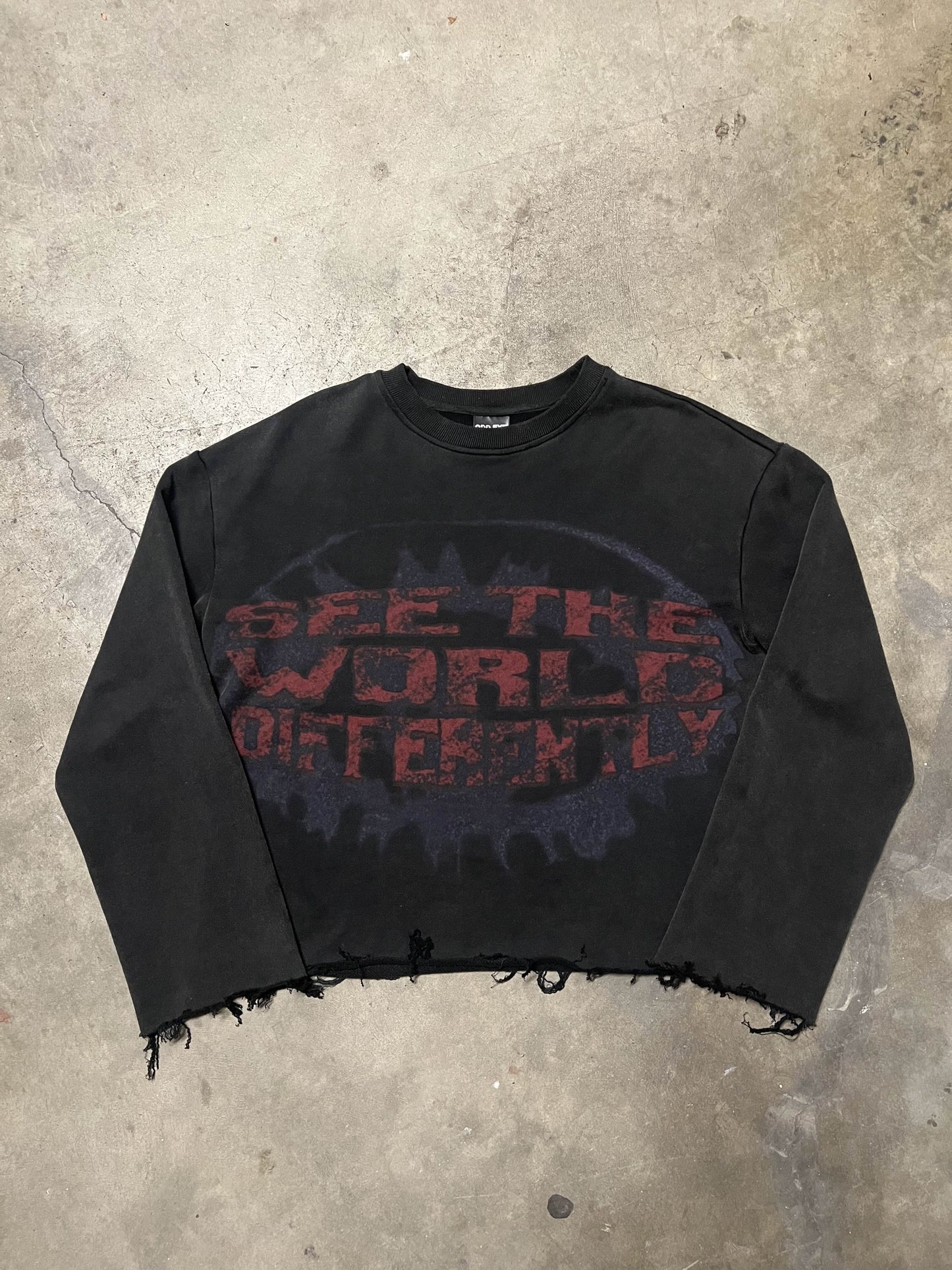 SEE THE WORLD DIFFERENTLY SWEATER